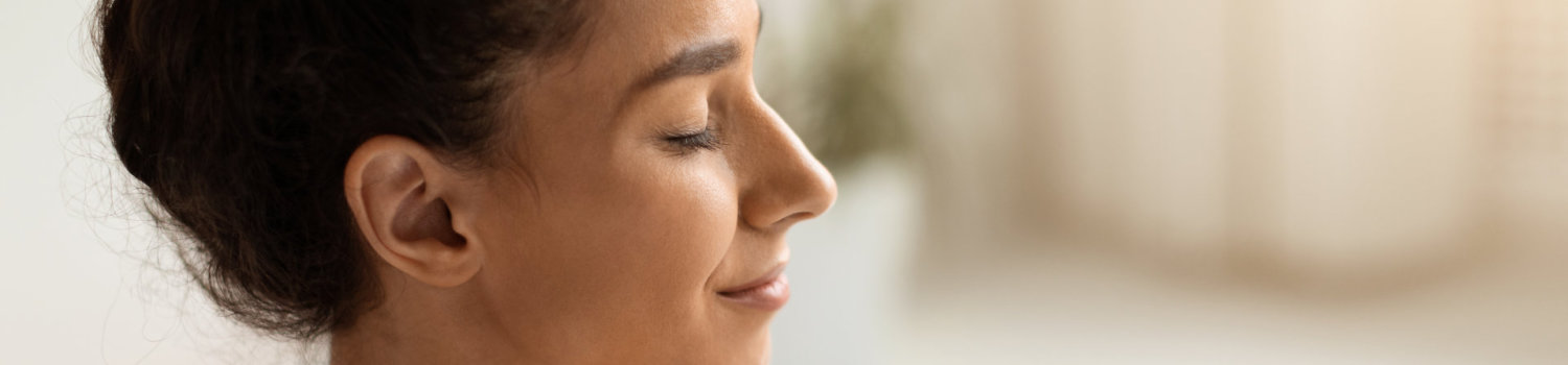 Mental Wellbeing. Closeup Shot Of Beautiful Calm Brunette Woman With Closed Eyes